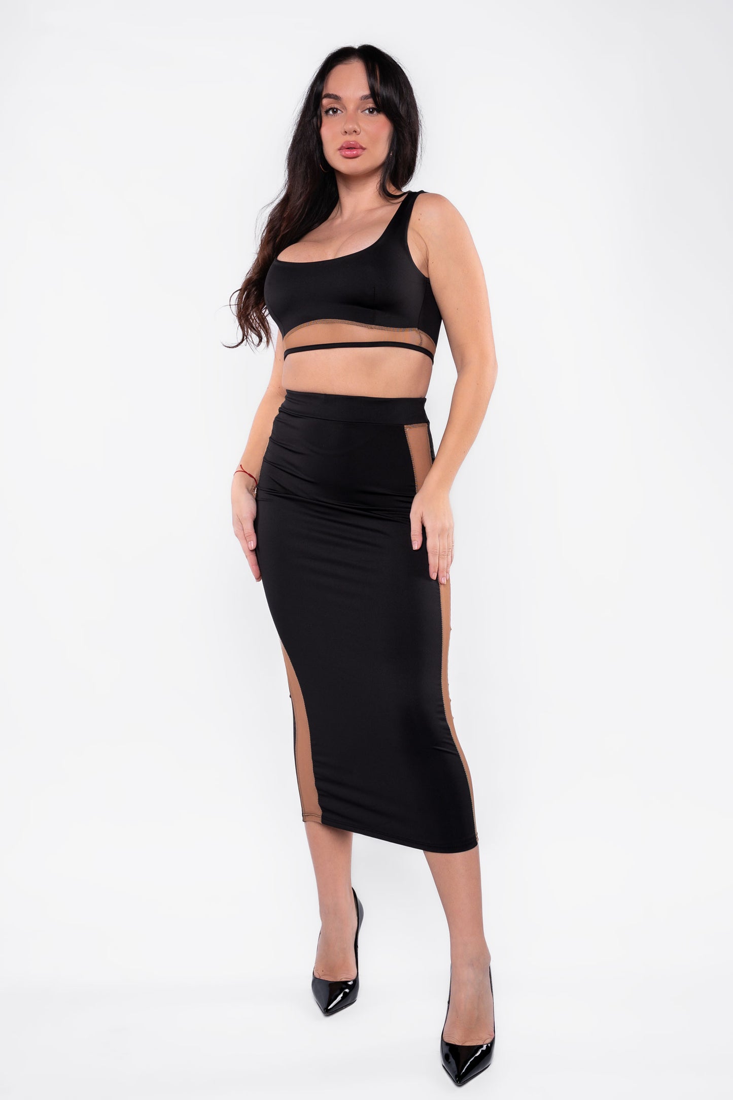 Conjunto de top y falda larga con trasparencias